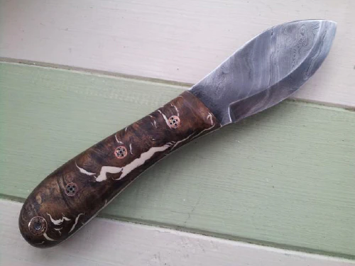 ../assets/images/knife_handmade_damascus_1181539.jpg